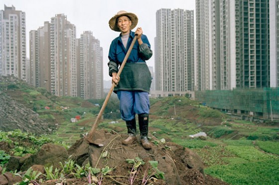 As Jiangbei rises into a forest of high-rises, shopping malls, and elevated roads, lifelong resident Ren Yindi, 66, continues to farm. (Tim Franco)